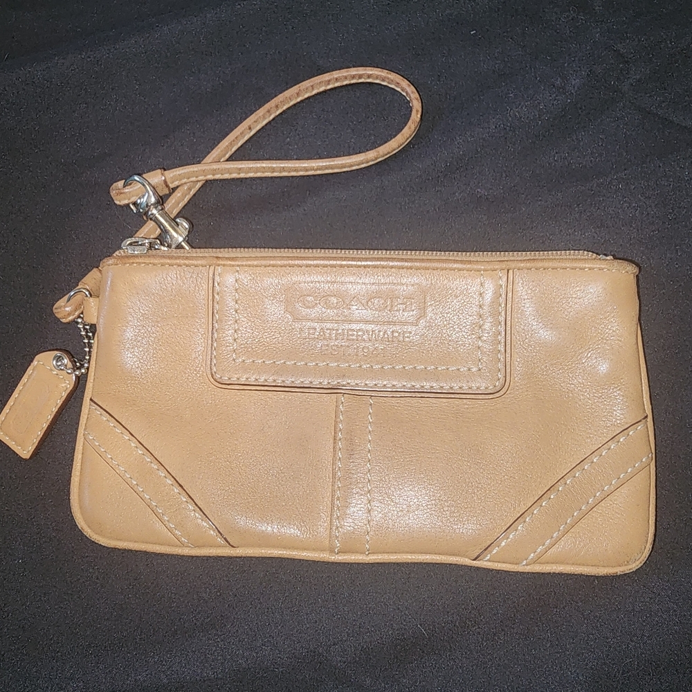 Tan Coach leather wristlet